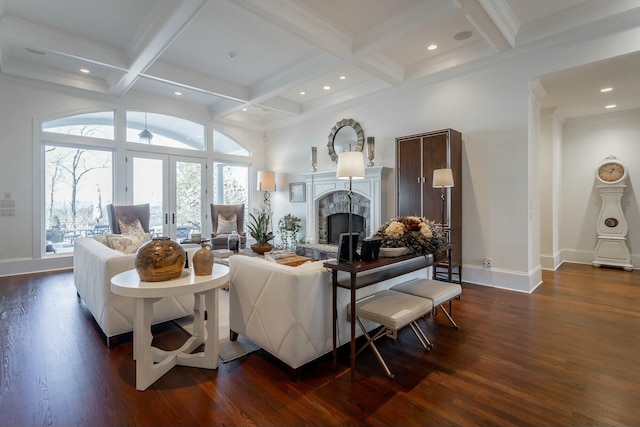 living room with french doors, a fireplace, dark wood-type flooring, and beam ceiling