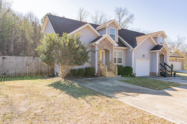 view of front facade featuring a garage and a front lawn