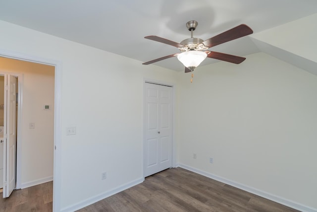 unfurnished bedroom with hardwood / wood-style flooring, a closet, and ceiling fan