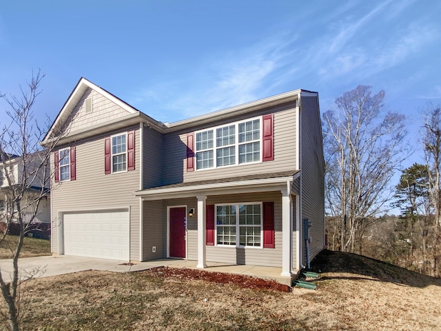 view of front facade featuring a garage and a porch