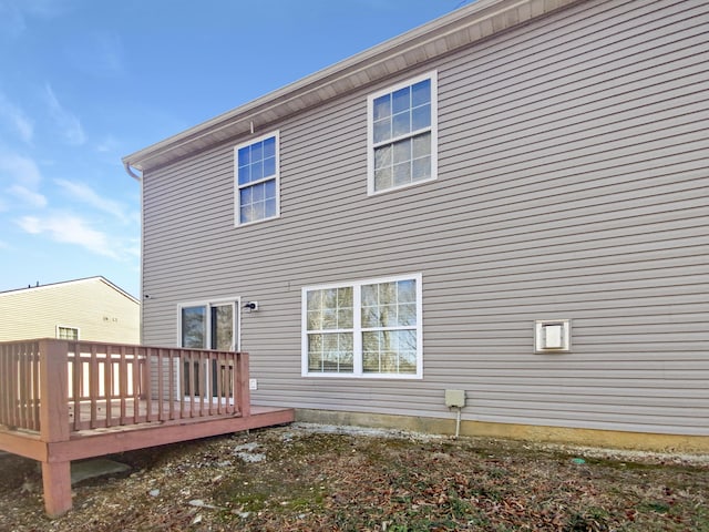 rear view of property with a deck