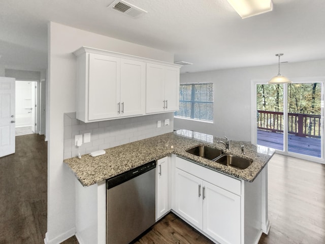 kitchen featuring sink, dishwasher, tasteful backsplash, light stone countertops, and white cabinets