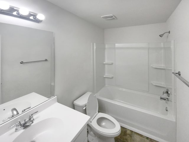 full bathroom featuring vanity,  shower combination, and toilet