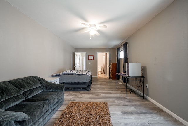 bedroom featuring ceiling fan and light hardwood / wood-style flooring