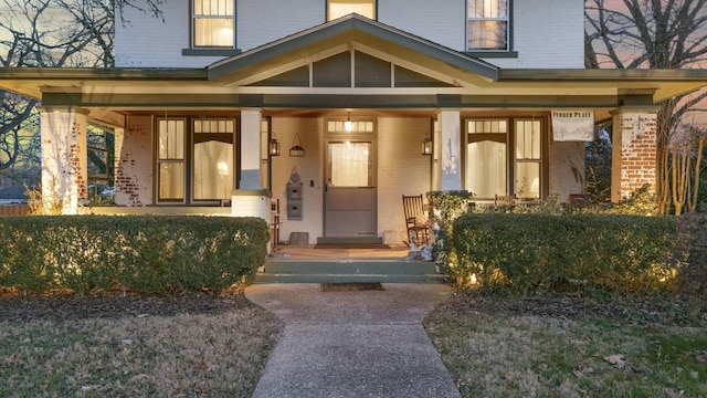 property entrance with a porch