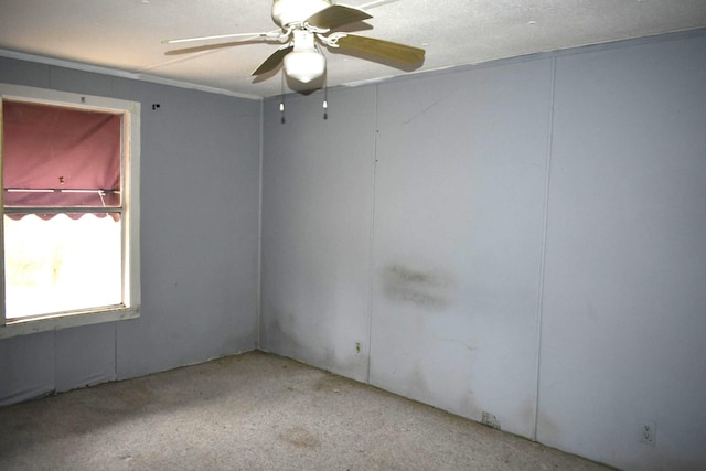 unfurnished room with ceiling fan