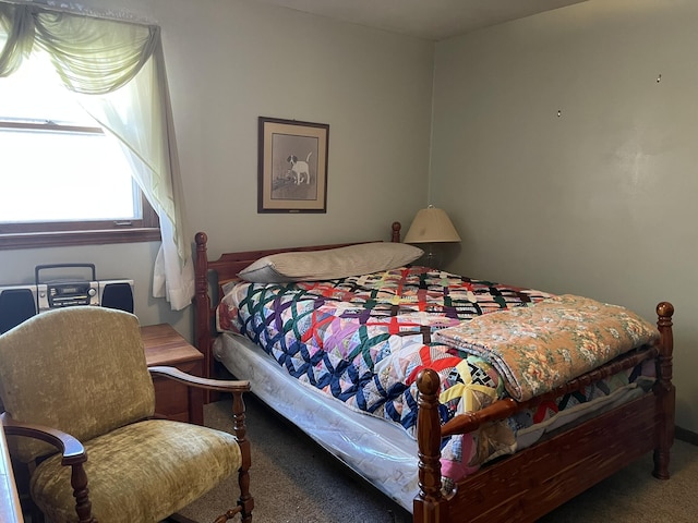 bedroom featuring carpet