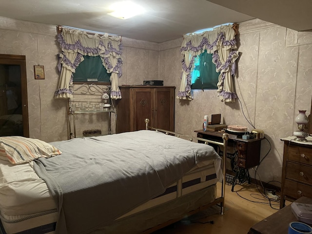 bedroom with wood-type flooring