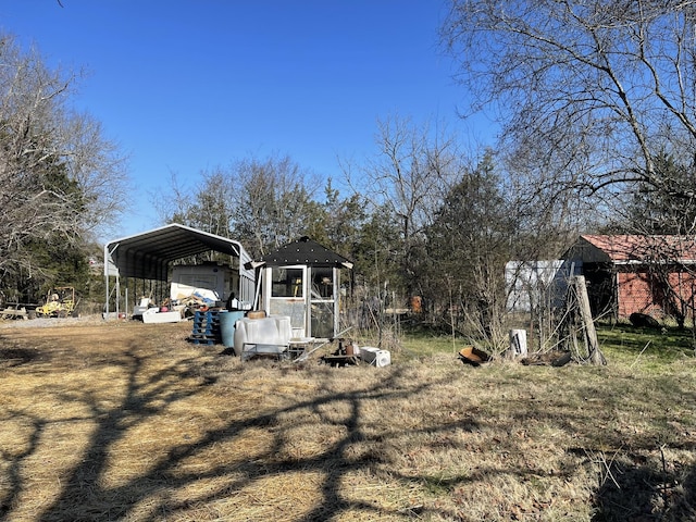 view of home's exterior featuring a carport