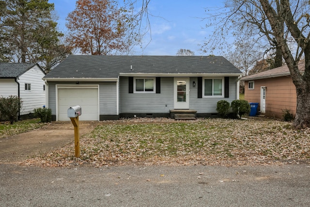 ranch-style home with a garage