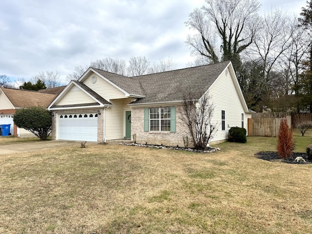 ranch-style house featuring a garage and a front lawn