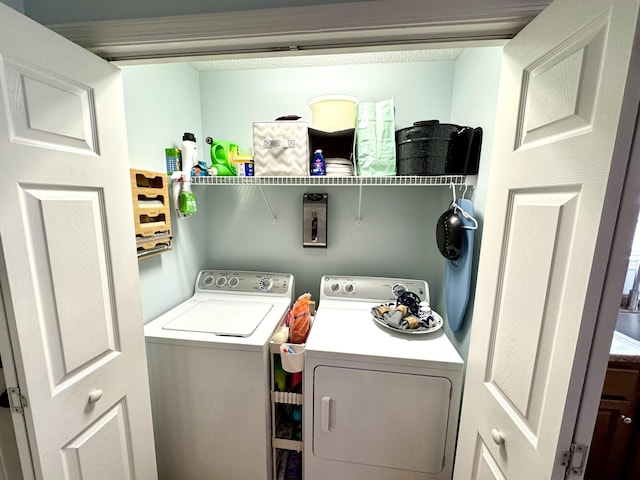 laundry area featuring washer and clothes dryer