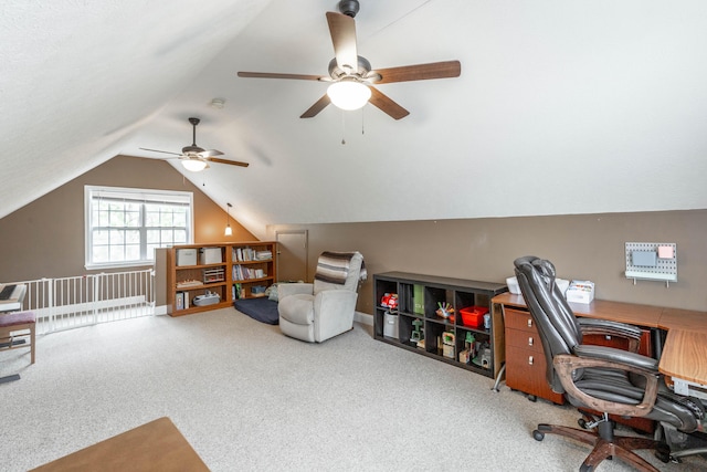 carpeted office with lofted ceiling