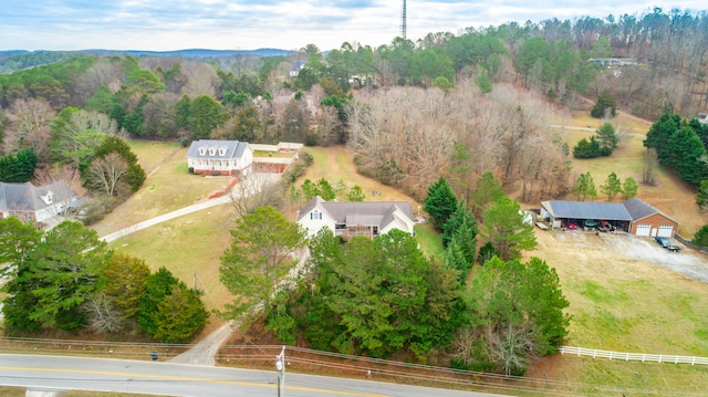 birds eye view of property featuring a rural view