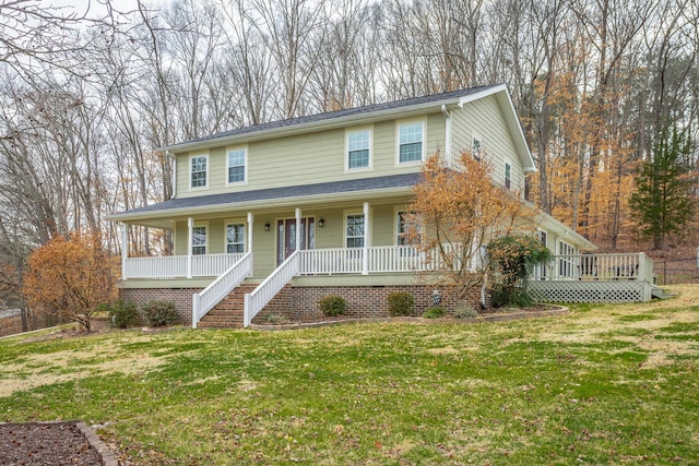 view of front facade featuring a front yard and a porch