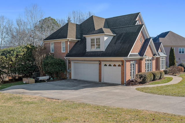 view of property exterior featuring a garage and a yard