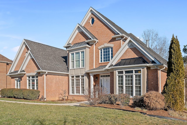 view of front facade with a front lawn