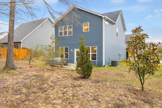 back of property featuring central AC and a patio