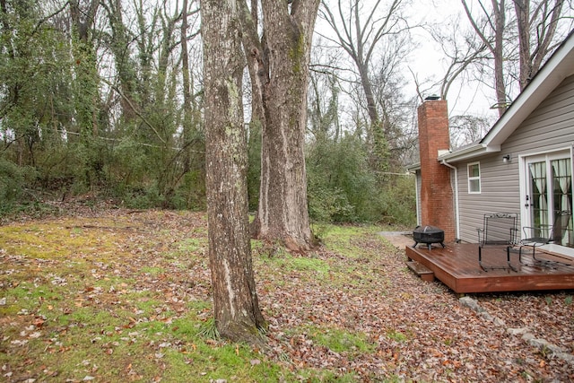 view of yard featuring a deck