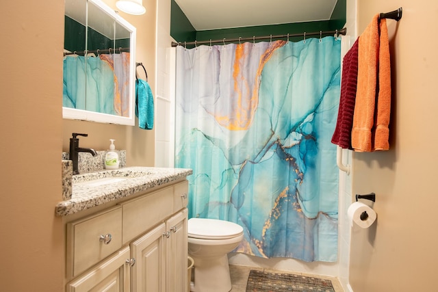 bathroom featuring vanity, tile patterned flooring, toilet, and a shower with shower curtain