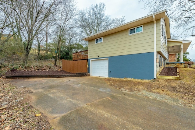 view of home's exterior featuring a garage