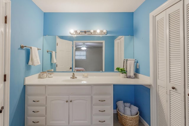 bathroom featuring vanity and ceiling fan