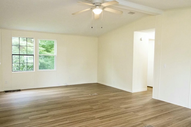 empty room featuring ceiling fan and wood-type flooring