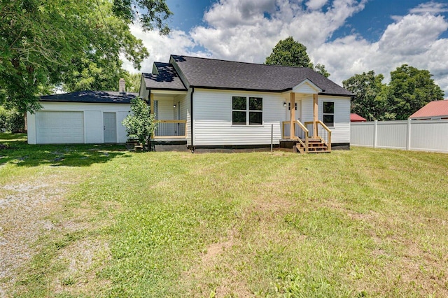 ranch-style home featuring a garage and a front lawn