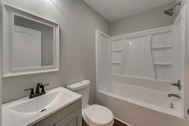 full bathroom with vanity, toilet, and washtub / shower combination