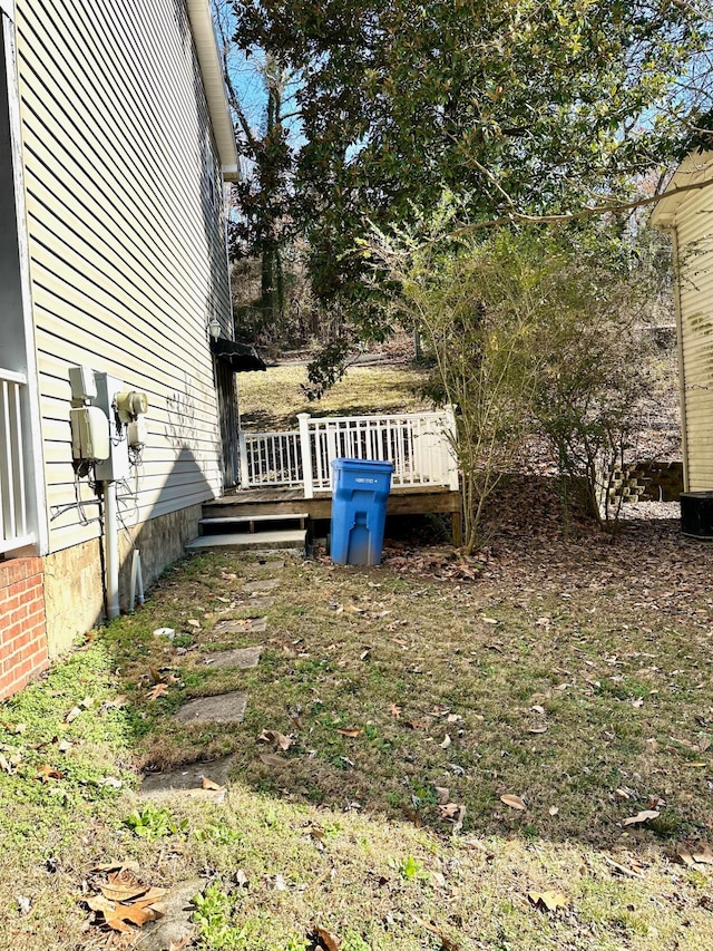 view of yard featuring a deck