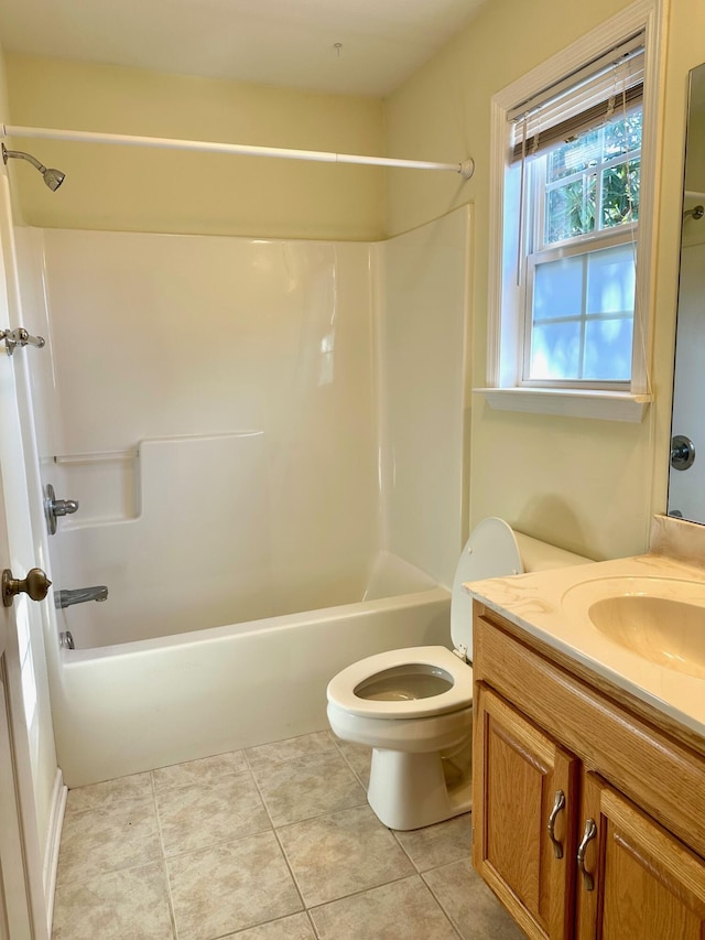 full bathroom with toilet, tile patterned floors, shower / washtub combination, and vanity