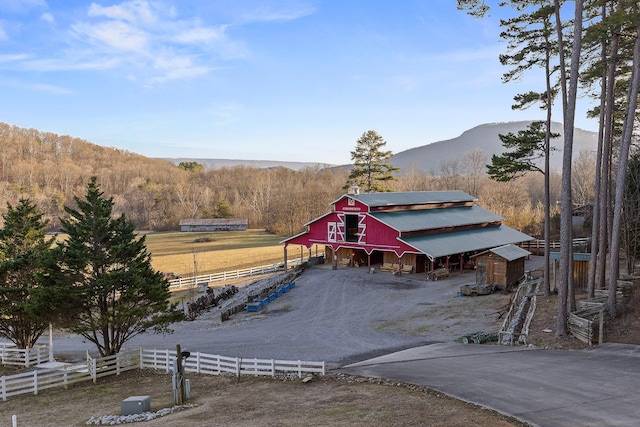 view of mountain feature featuring a rural view