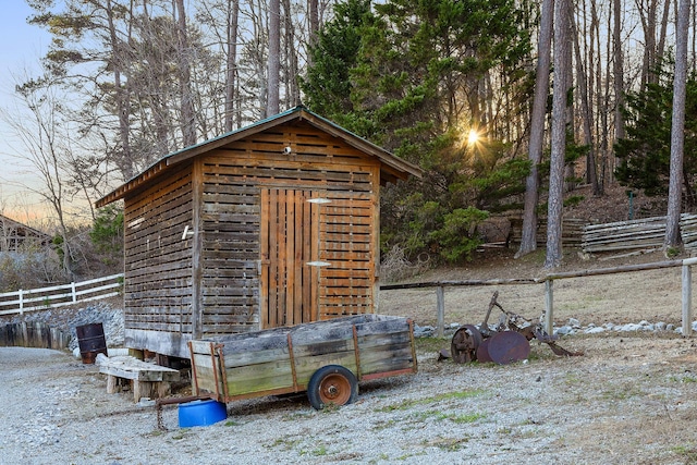 view of outdoor structure at dusk