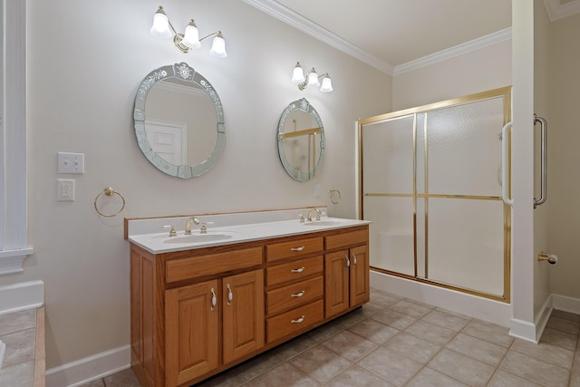 bathroom with crown molding, tile patterned floors, vanity, and a shower with door