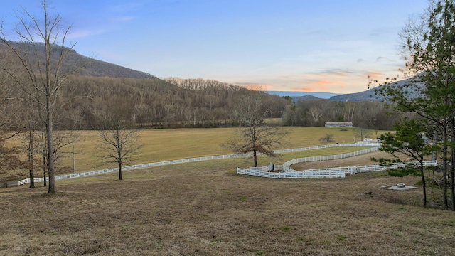 exterior space featuring a rural view and a mountain view