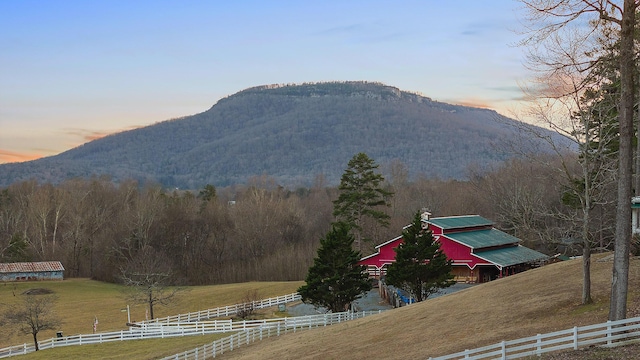 property view of mountains featuring a rural view