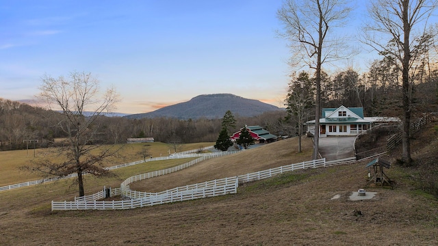 mountain view featuring a rural view