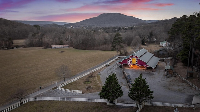 aerial view at dusk with a mountain view