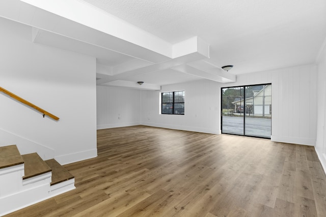 unfurnished living room with light wood-type flooring