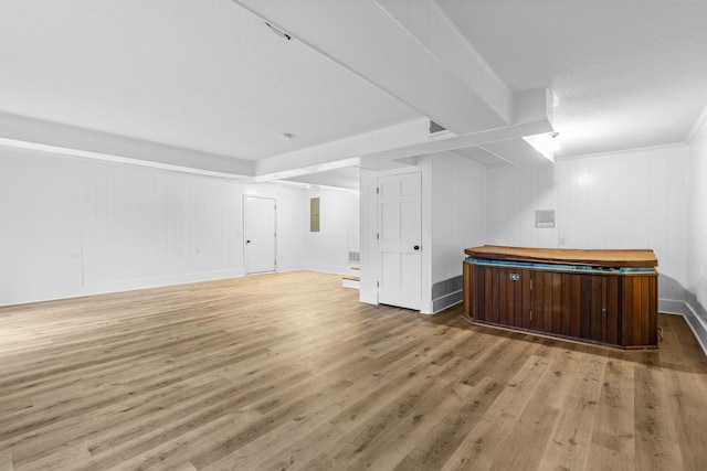 bar featuring hardwood / wood-style flooring