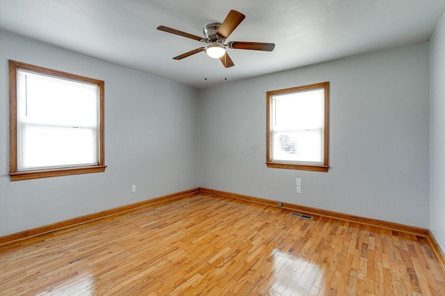 unfurnished room featuring ceiling fan and light wood-type flooring