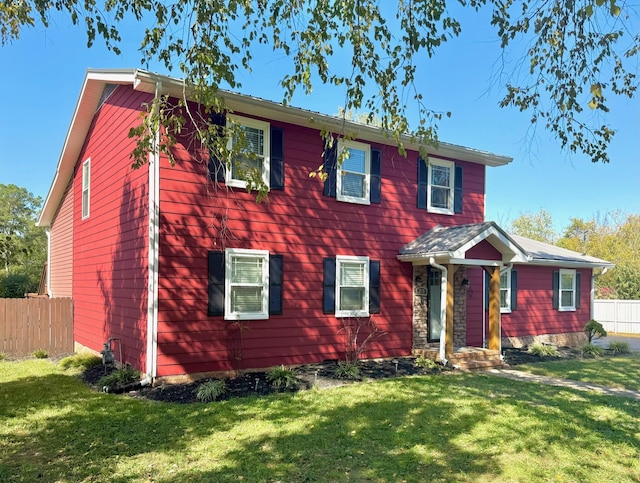 view of front of home with a front yard