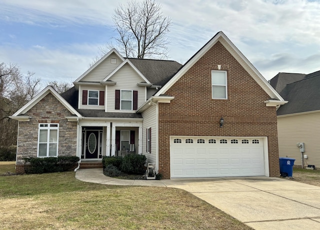 view of front of home featuring a garage and a front lawn