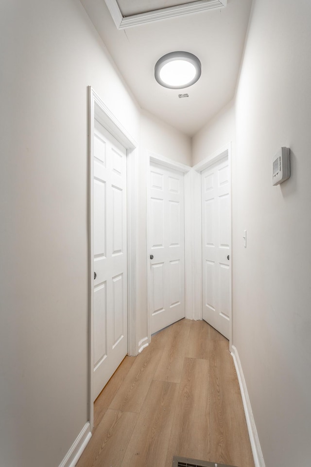 hallway featuring light hardwood / wood-style floors