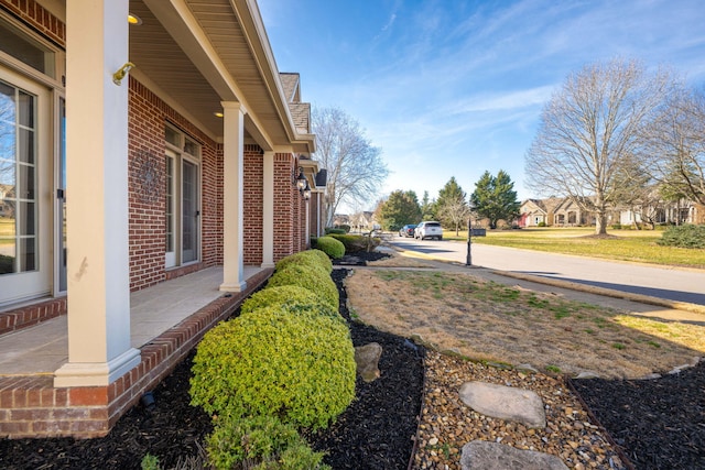 view of yard with a porch