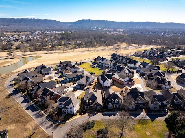 birds eye view of property featuring a residential view and a water view