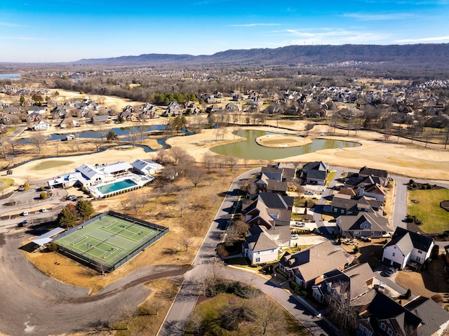 bird's eye view featuring a residential view and a water and mountain view