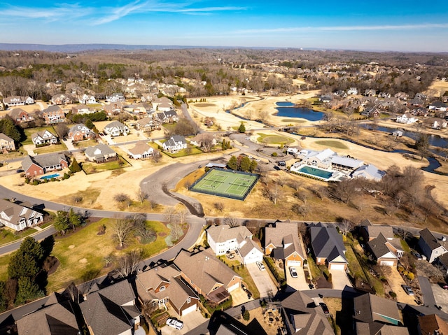 aerial view with a residential view and a water view