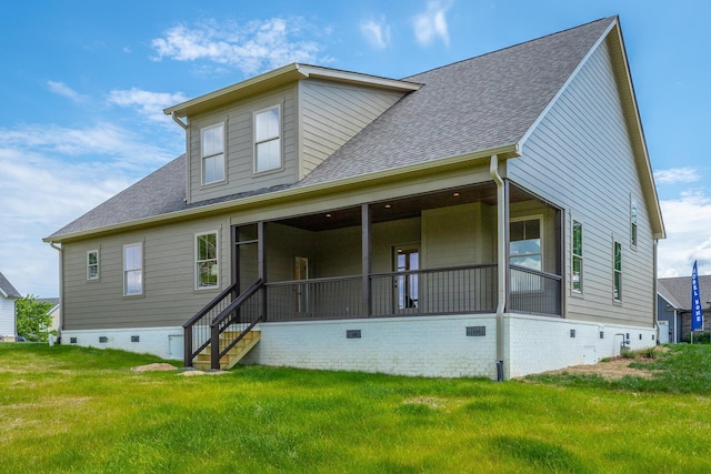 back of house with a yard