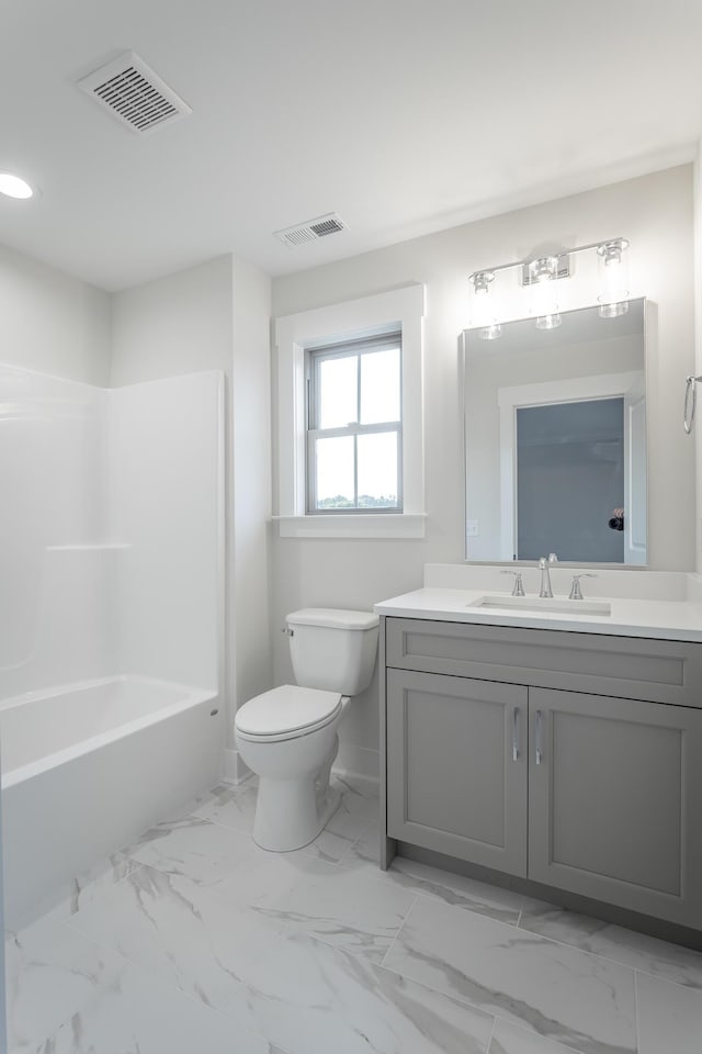 full bathroom with vanity, toilet, and shower / bath combination